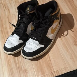 Nike Air Jordan Black and Gold Sneakers High-Top Design